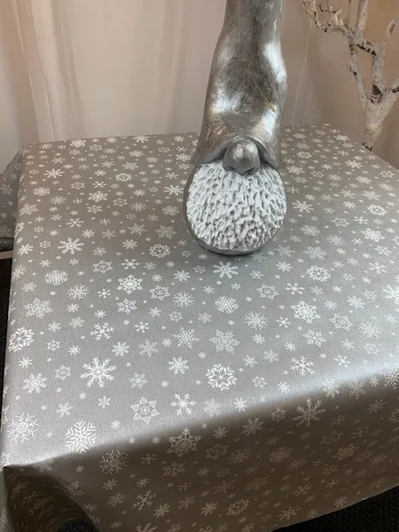 Snöflinga på grå botten